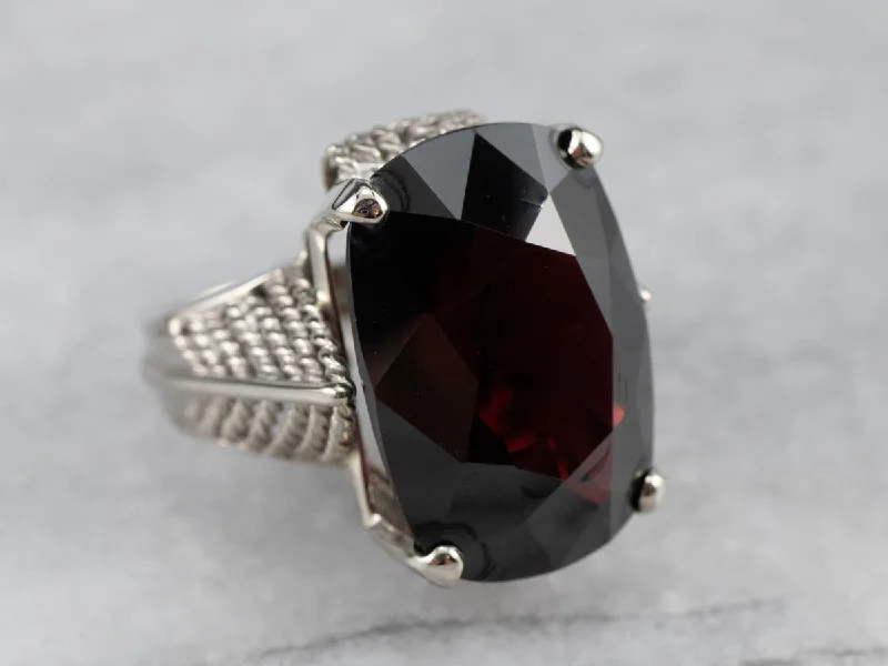 Topaz Gemstone Rings with a Faceted Cut and Shimmering EffectBold Garnet Gold Cocktail Ring