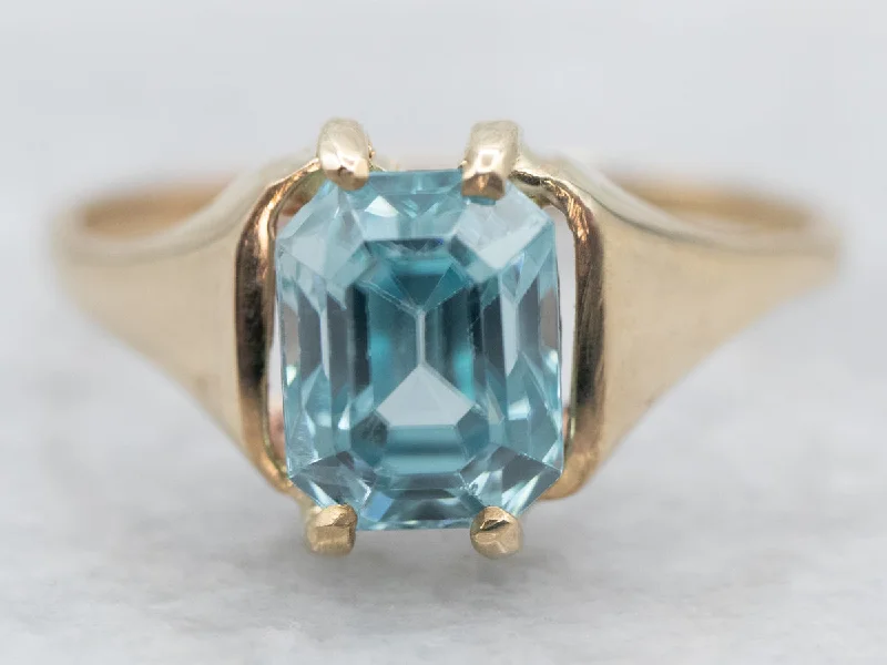 Sapphire Gemstone Rings in a Victorian - Inspired DesignYellow Gold Emerald Cut Blue Zircon Solitaire Ring