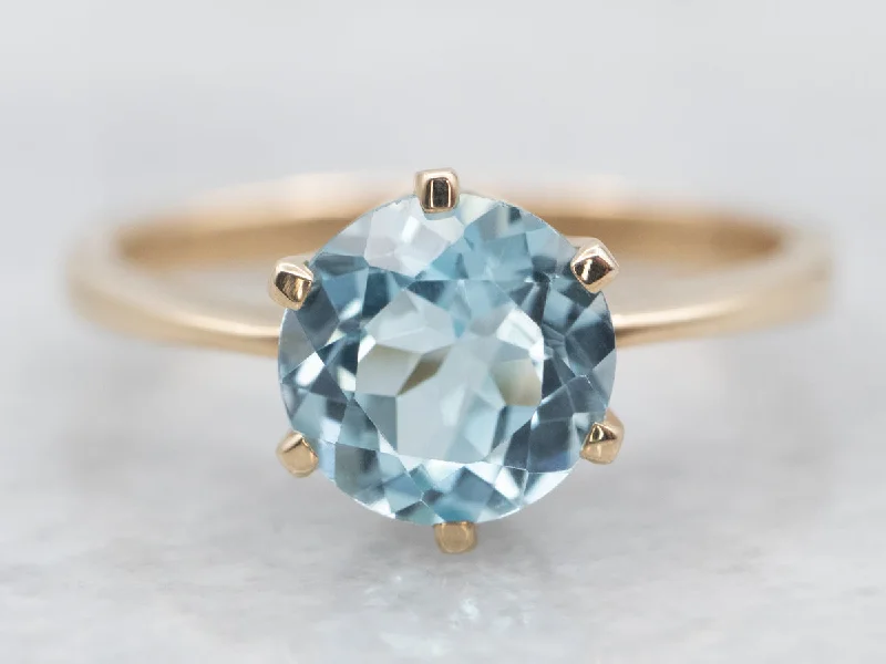 Emerald Gemstone Rings with Diamond - Encrusted HalosYellow Gold Blue Topaz Solitaire Ring